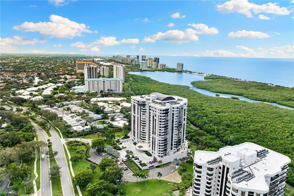6001 Pelican Bay Boulevard, Unit PHA Naples, FL 34108 - Photo 48 of 50 a view of a city with tall buildings