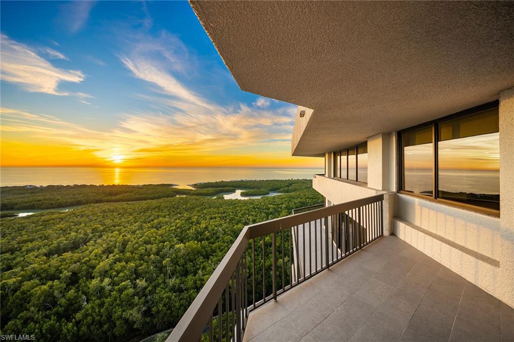 6001 Pelican Bay Boulevard, Unit PHA Naples, FL 34108 - Photo 9 of 50 a view of balcony