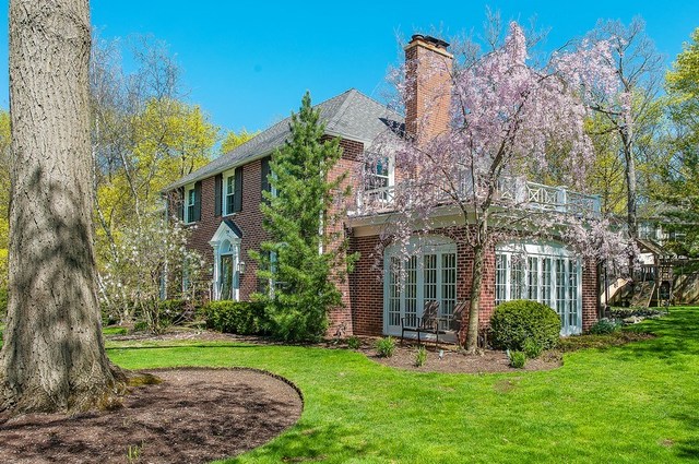 210 Franklin Road Glencoe, IL 60022 - Photo 2 of 20 a view of a house with a yard and plants
