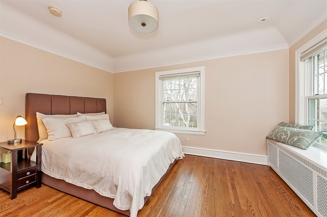 210 Franklin Road Glencoe, IL 60022 - Photo 14 of 20 a bedroom with a bed and wooden floor