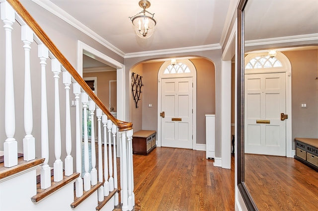 210 Franklin Road Glencoe, IL 60022 - Photo 4 of 20 a view of entryway with wooden floor and stairs