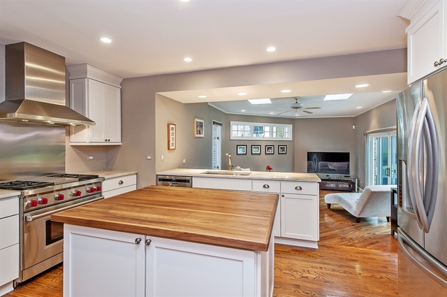 210 Franklin Road Glencoe, IL 60022 - Photo 8 of 20 a kitchen with stainless steel appliances granite countertop a stove and a refrigerator