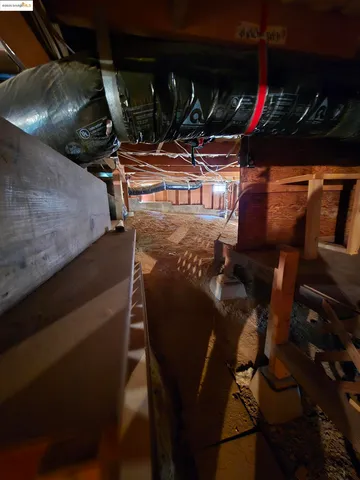 a room with wooden walls and outdoor space