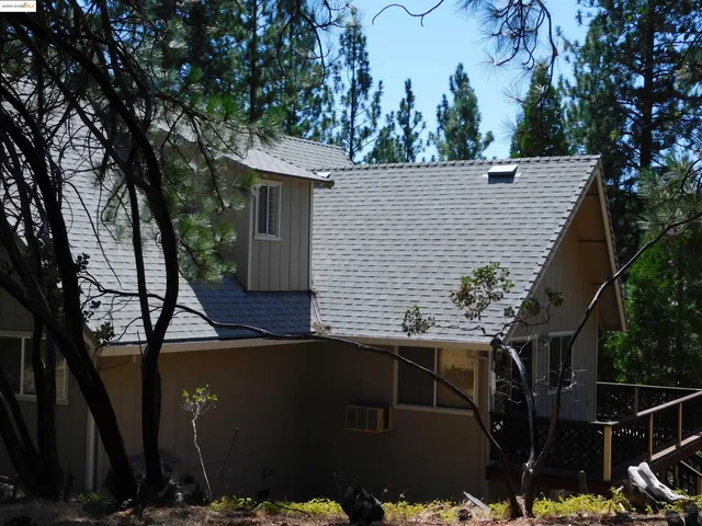 a view of house with outdoor space