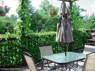 8902 West Coon Lake Road Gregory, MI 48137 - Photo 7 of 17 Private Patio Coon Lake