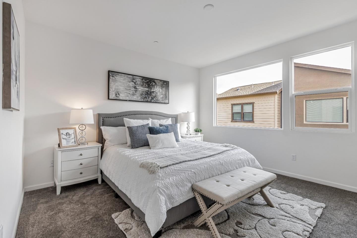 500 Lapin Place Hayward, CA 94541 - Photo 23 of 36 a bedroom with a bed and a lamp on dresser