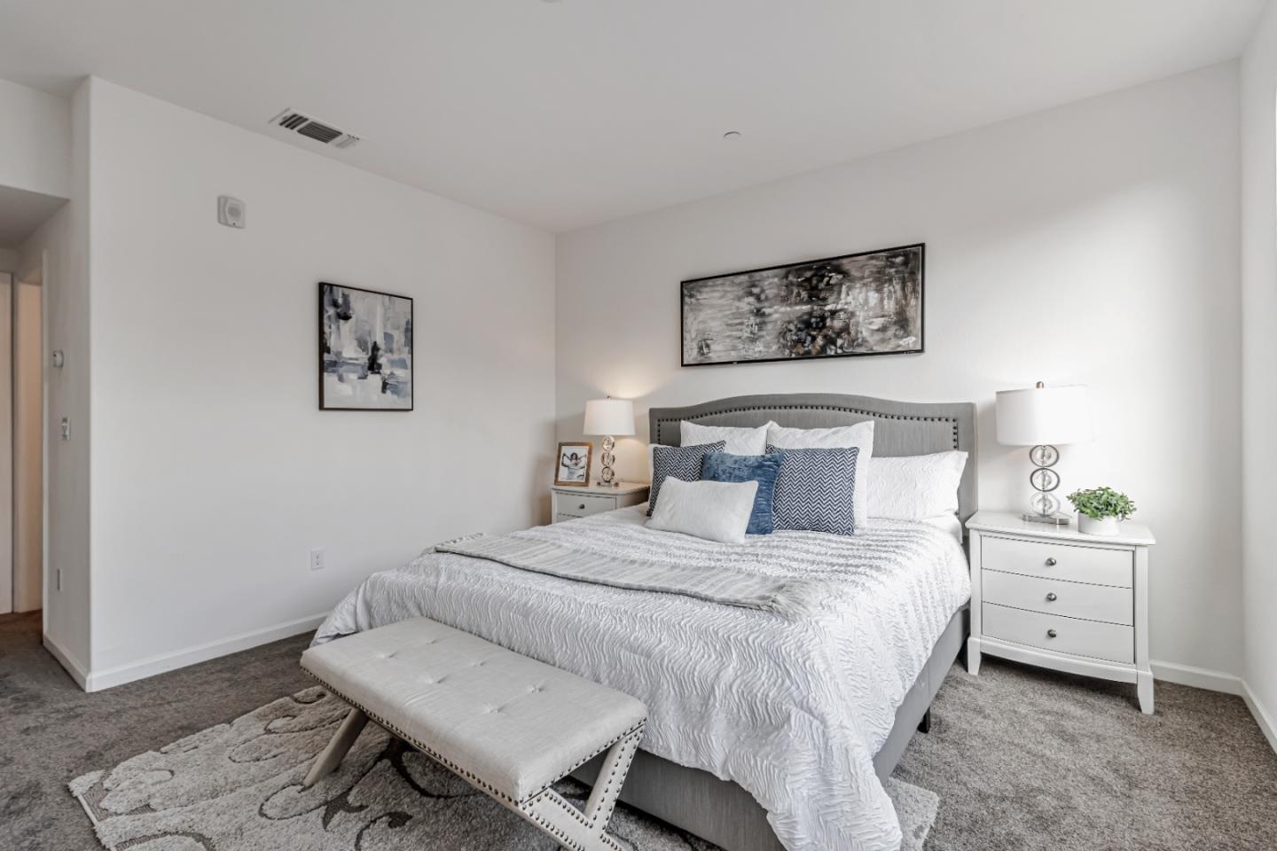 500 Lapin Place Hayward, CA 94541 - Photo 24 of 36 a bedroom with a bed and a lamp on dresser