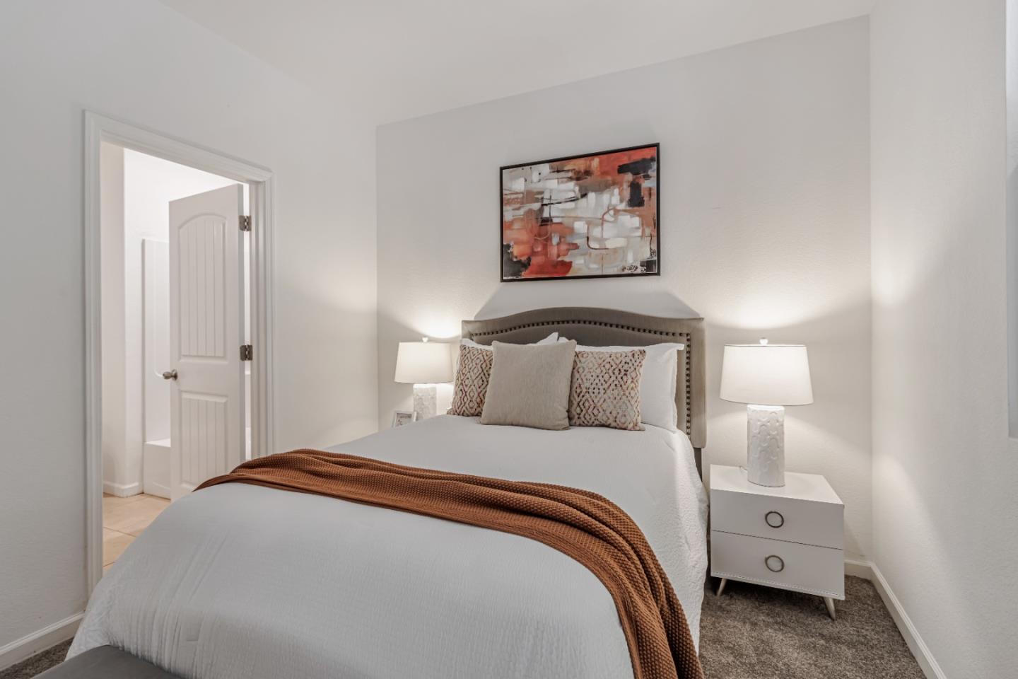 500 Lapin Place Hayward, CA 94541 - Photo 7 of 36 a bedroom with a bed and a lamp