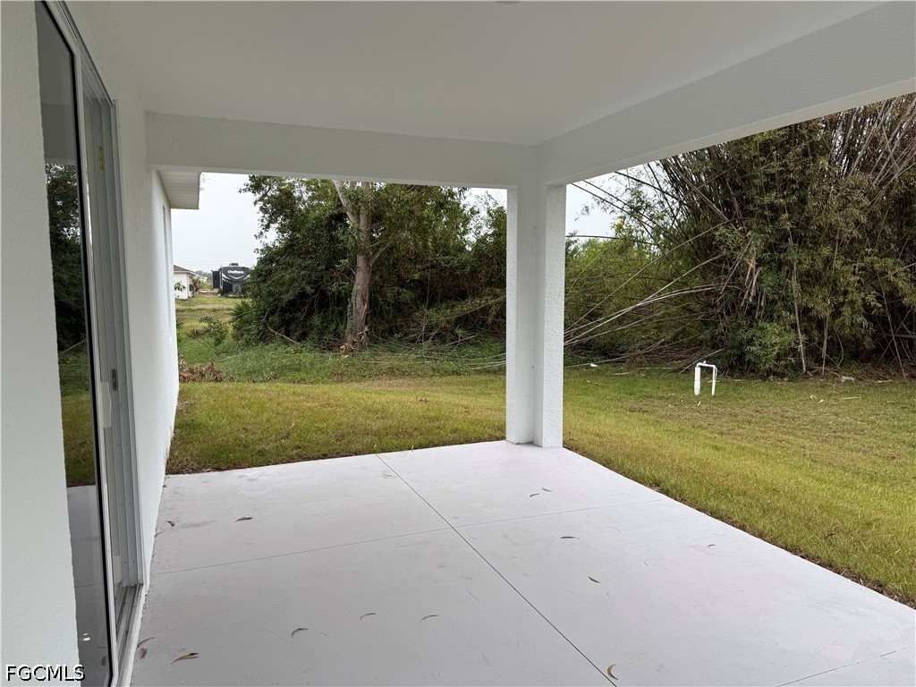 3203 24th Street Southwest Lehigh Acres, FL 33976 - Photo 13 of 19 a view of a room with a large trees