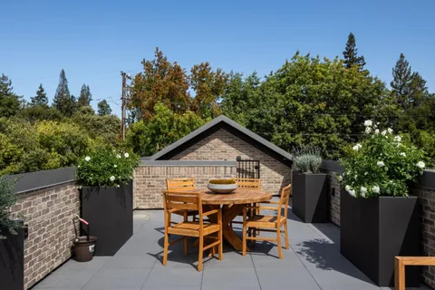 a outdoor space with patio couch and a swing