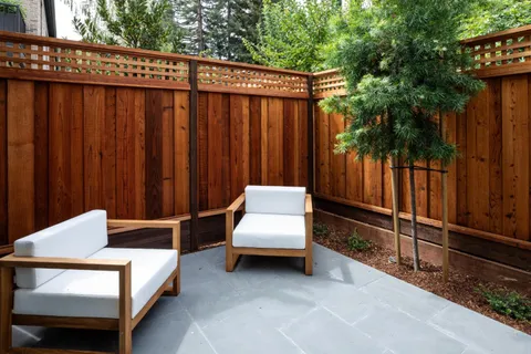 a view of a livingroom with furniture and windows