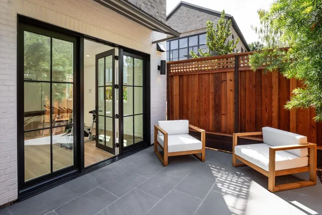 a front view of a house with a glass door