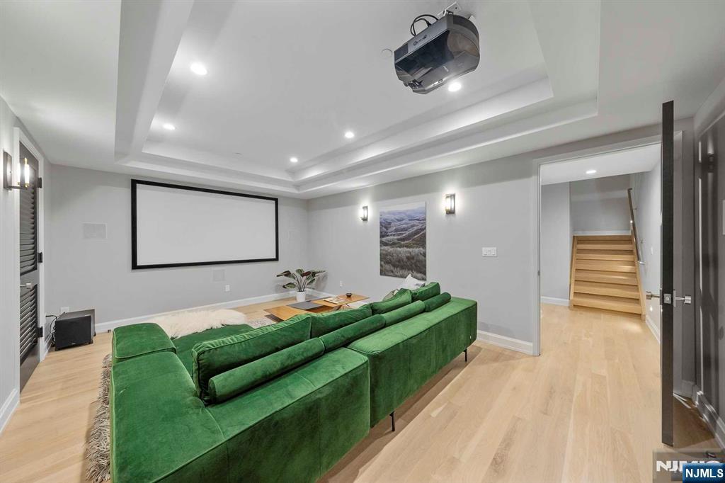 8822 Churchill Road North Bergen, NJ 07047 - Photo 11 of 50 a living room with furniture and a flat screen tv