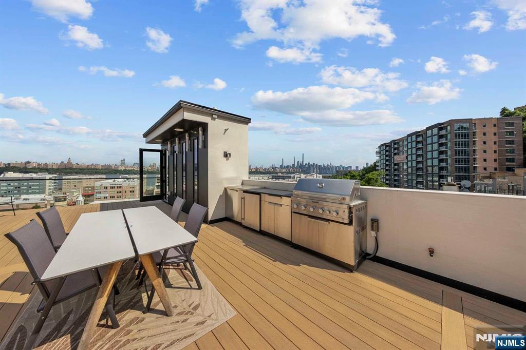 8822 Churchill Road North Bergen, NJ 07047 - Photo 45 of 50 a view of a terrace with furniture and a table