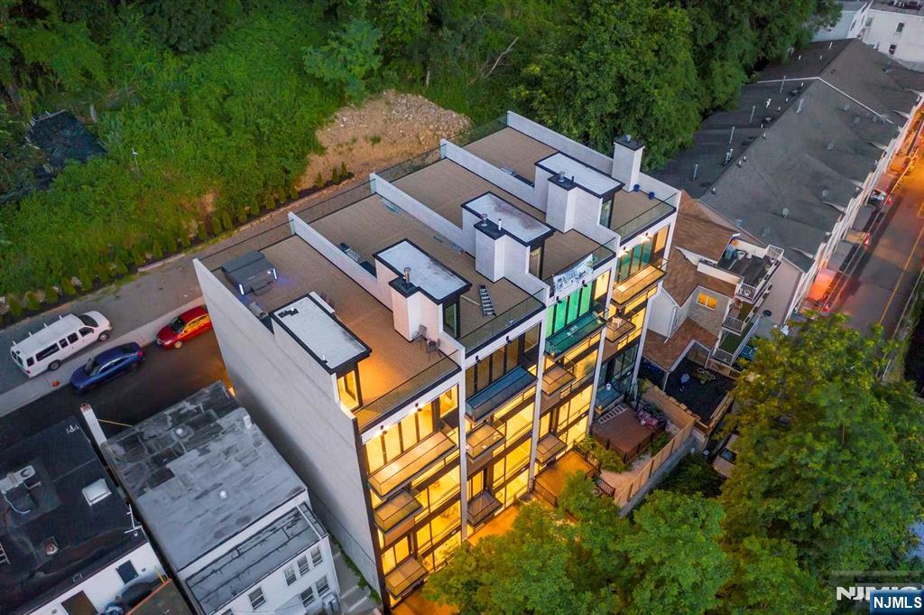 8822 Churchill Road North Bergen, NJ 07047 - Photo 49 of 50 an aerial view of a house with a garden