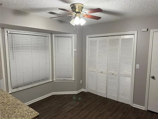 a view of cabinets with wooden floor and cabinets