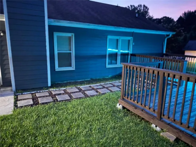 a view of a backyard with a garden