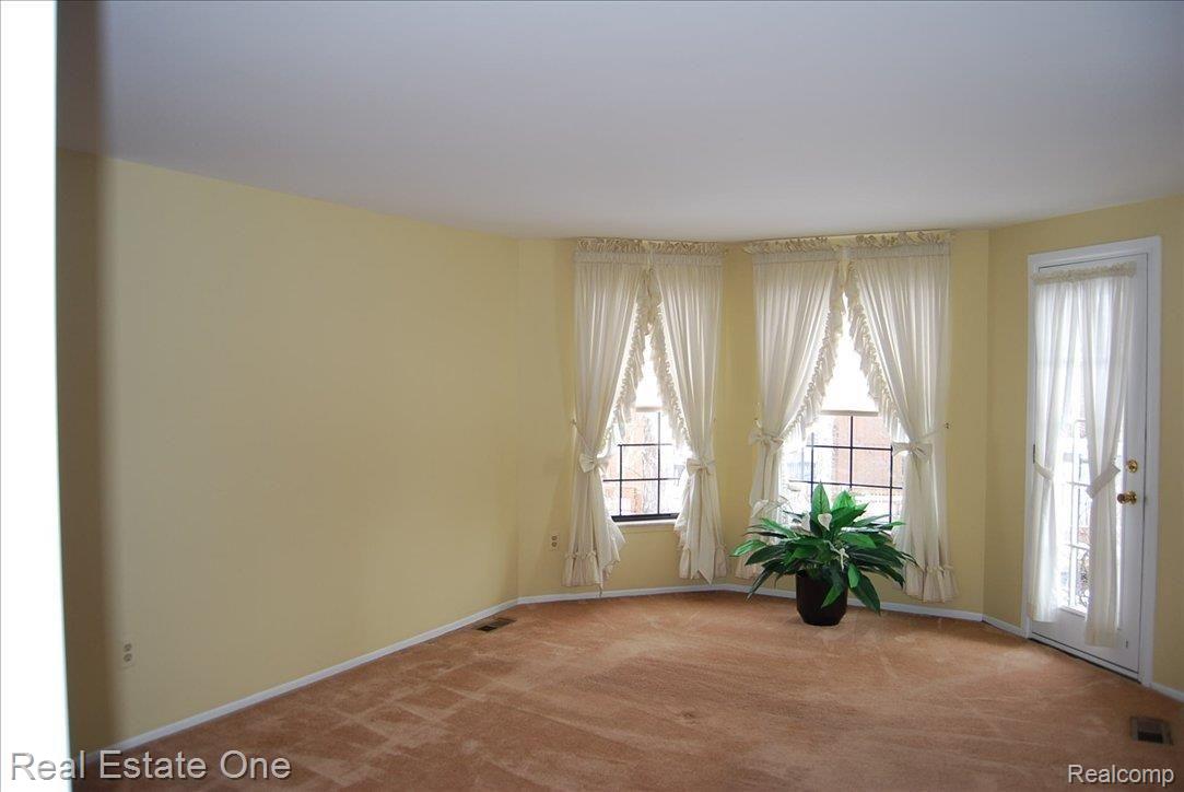1865 Christy Court, Unit 202 Rochester, MI 48309 - Photo 12 of 19 Master Bedroom w/Bay