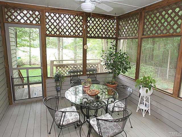 11001 Mason Ridge Drive Raleigh, NC 27614 - Photo 6 of 7 a outdoor dining space with furniture and wooden floor