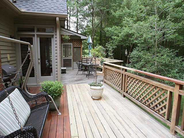 11001 Mason Ridge Drive Raleigh, NC 27614 - Photo 7 of 7 a view of balcony with chairs and wooden fence