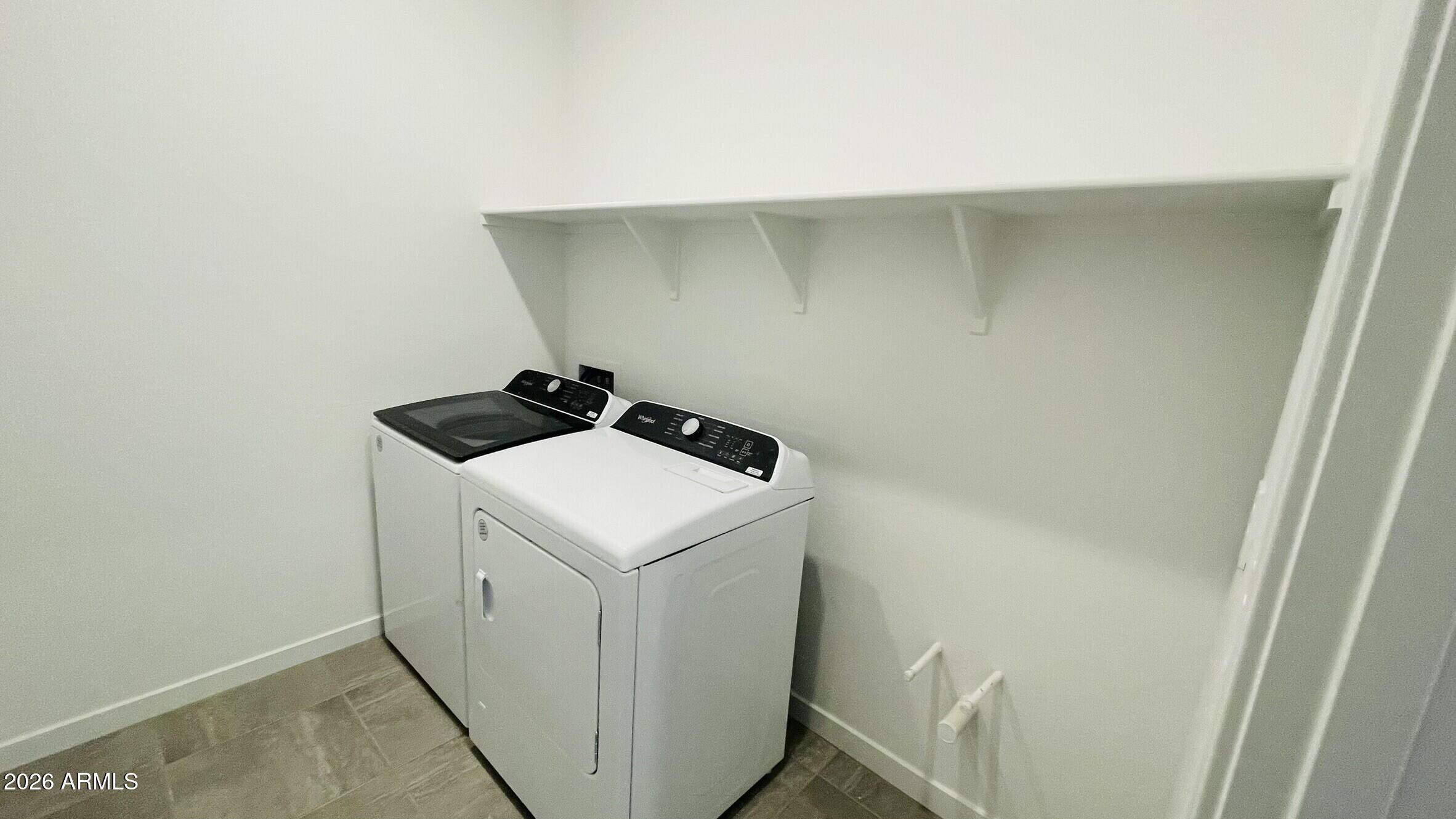 36972 West Prado Street Maricopa, AZ 85138 - Photo 14 of 17 a utility room with dryer and washer