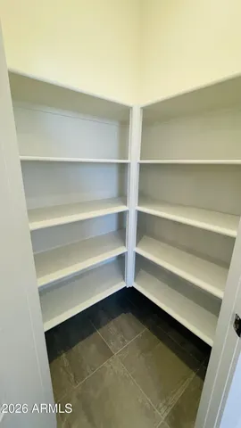 a kitchen with a sink a stove a refrigerator and window