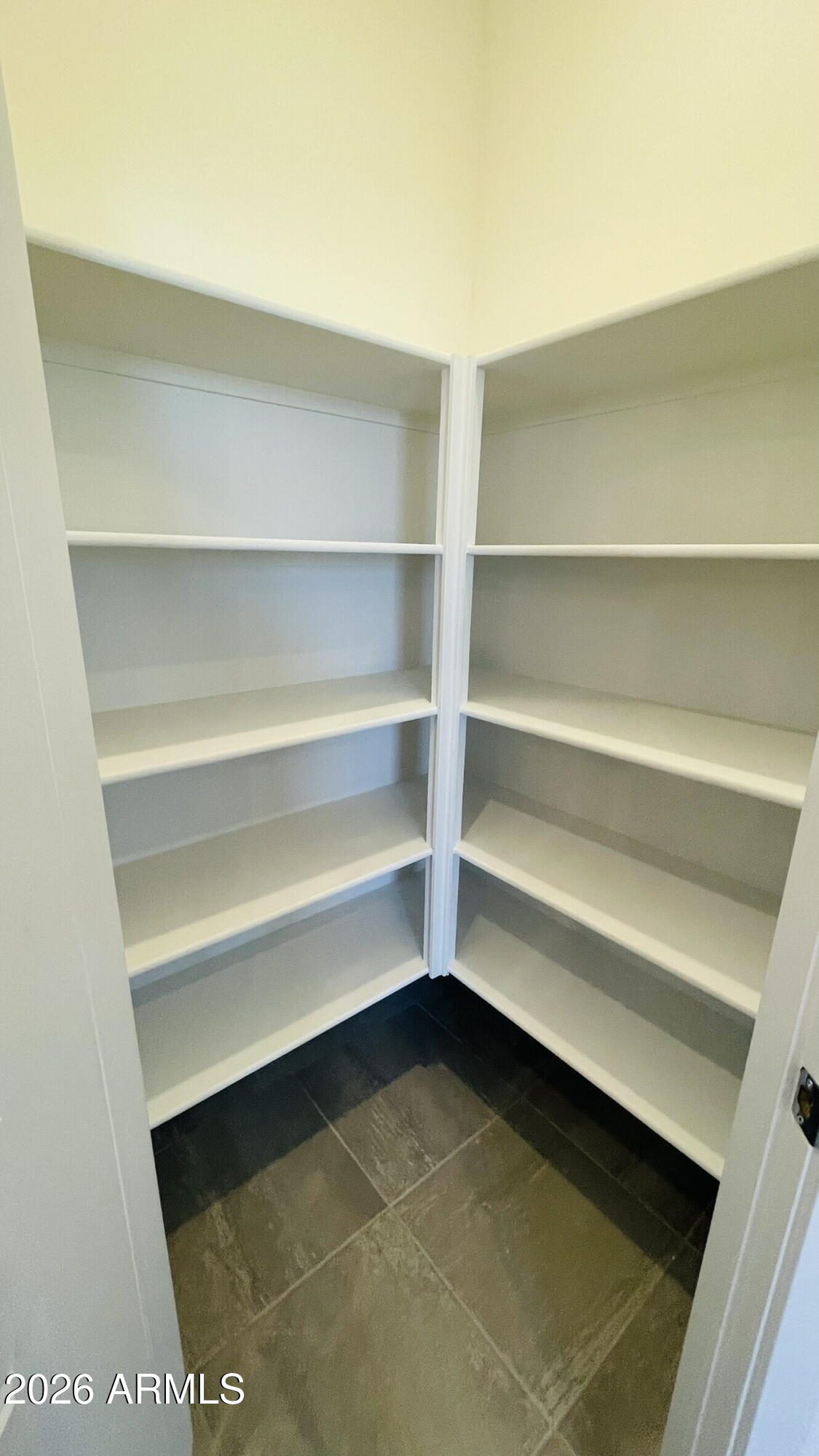 36972 West Prado Street Maricopa, AZ 85138 - Photo 8 of 18 a storage room with wooden floor