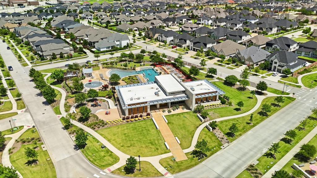 1933 Snapdragon Road Frisco, TX 75033 - Photo 40 of 40 Aerial perspective showcasing a residential community with a central amenity center
