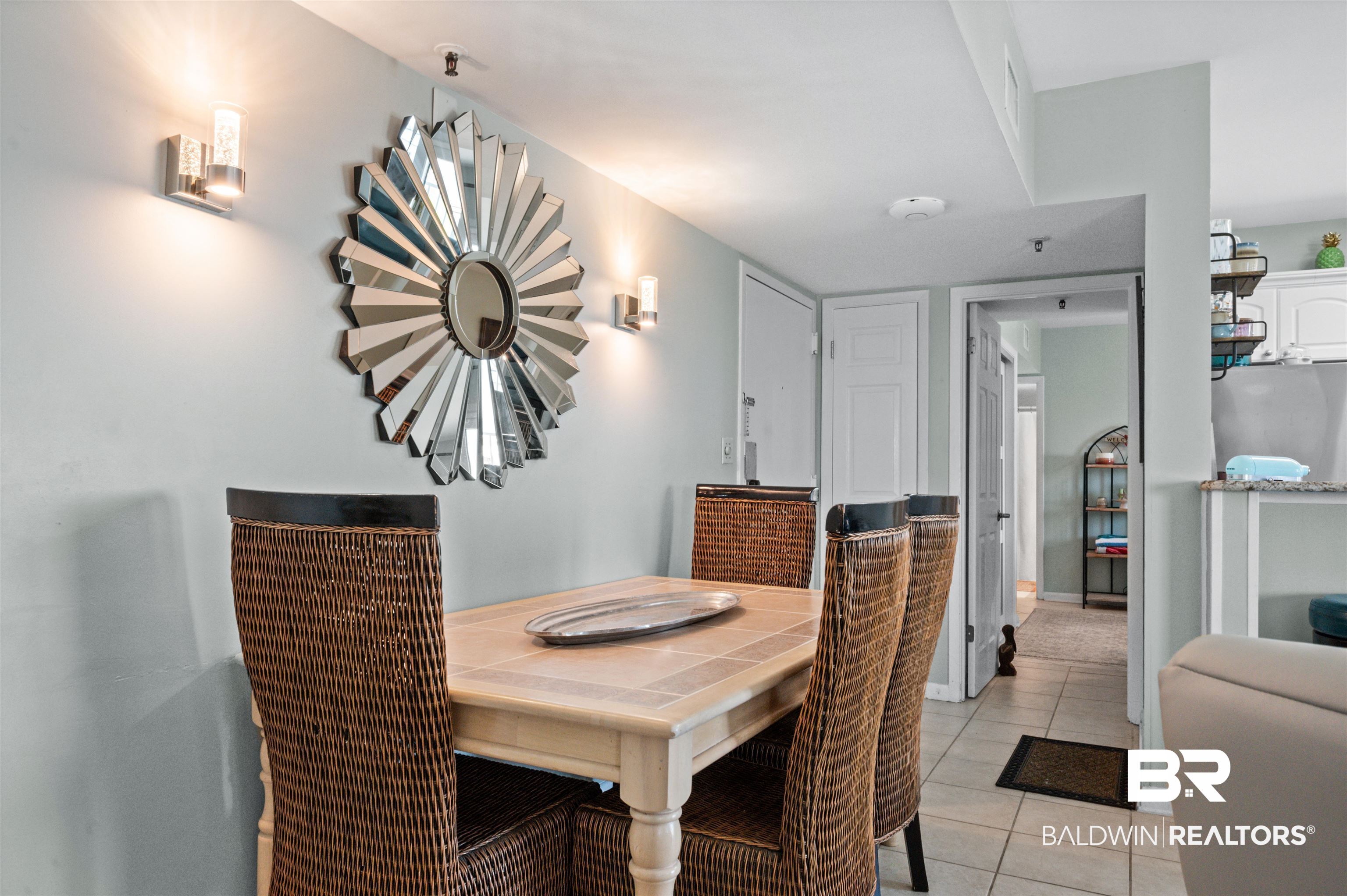 375 Plantation Road, Unit 5610 Gulf Shores, AL 36542 - Photo 6 of 33 Dining area featuring light tile patterned flooring