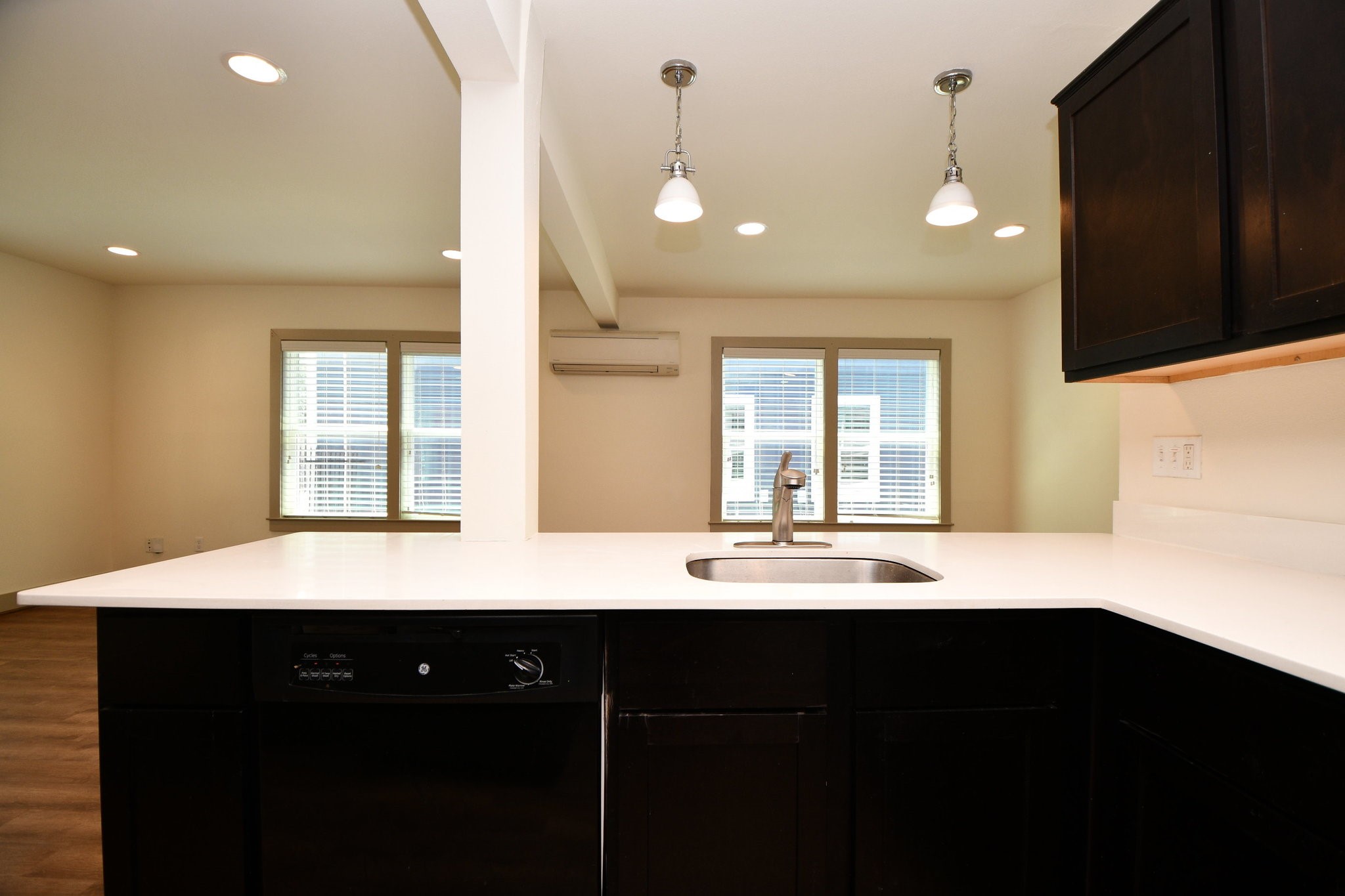 1011 Enid Street, Unit 2 Houston, TX 77009 - Photo 6 of 14 Modern kitchen with pendant lighting and quartz countertops.