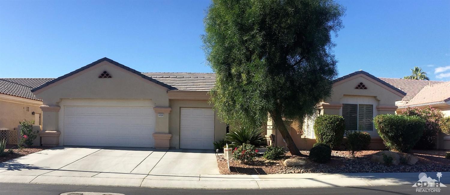 a front view of a house with yard