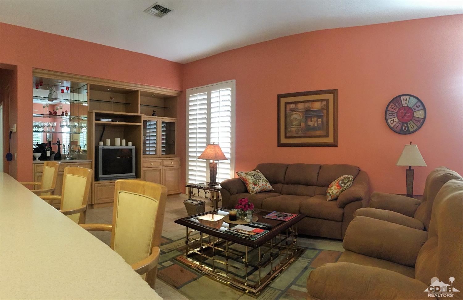 37235 Skycrest Road Palm Desert, CA 92211 - Photo 11 of 34 a living room with furniture a window and a fireplace