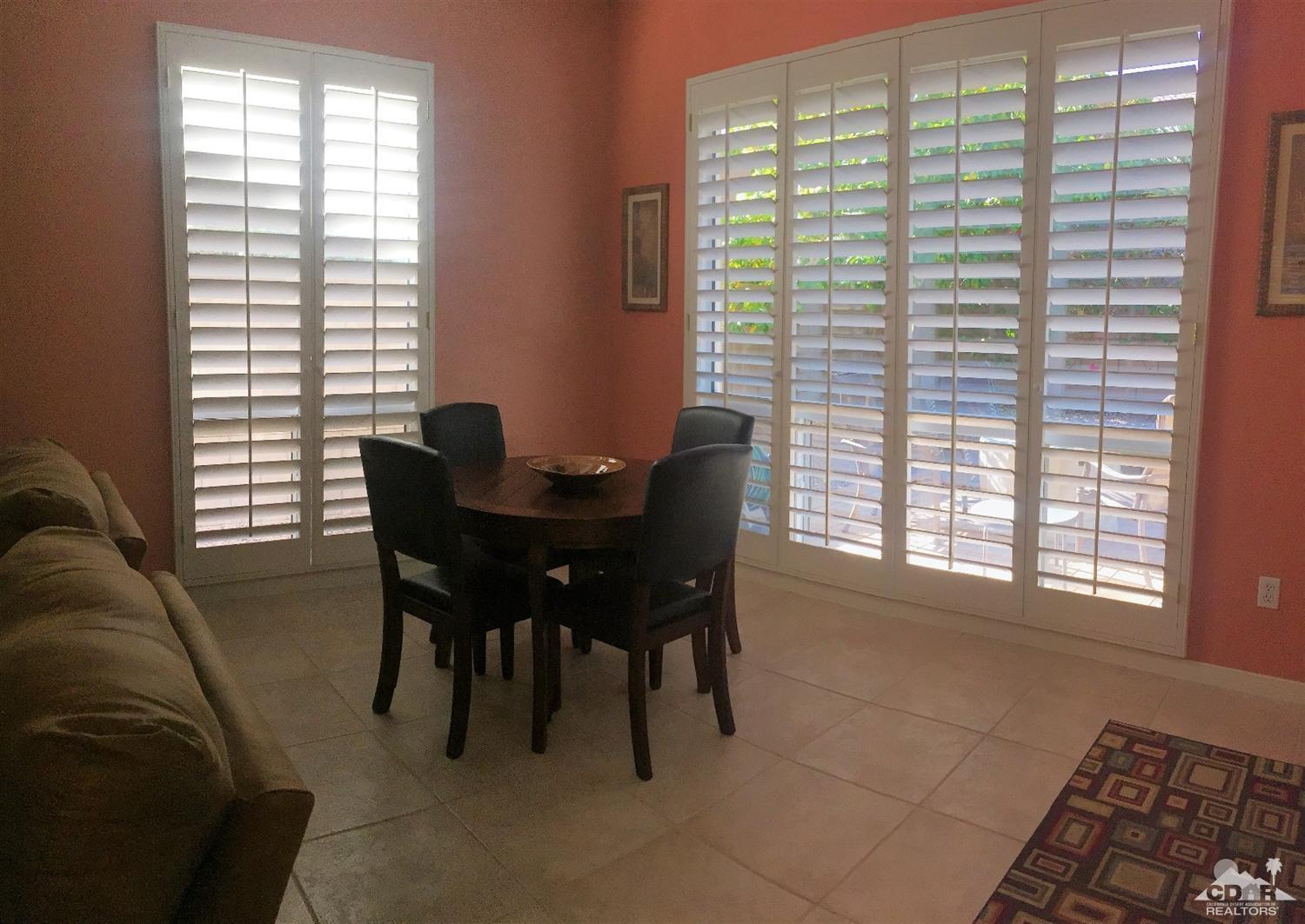 37235 Skycrest Road Palm Desert, CA 92211 - Photo 13 of 34 a dining room with furniture and windows