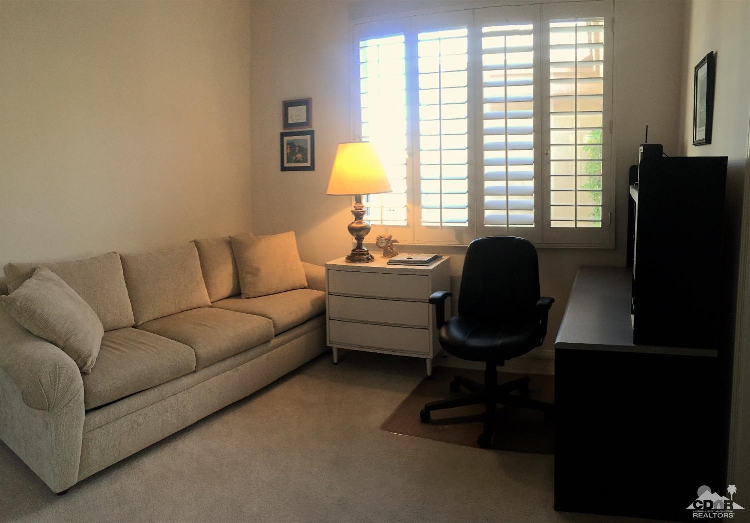 37235 Skycrest Road Palm Desert, CA 92211 - Photo 16 of 34 a living room with furniture and a window
