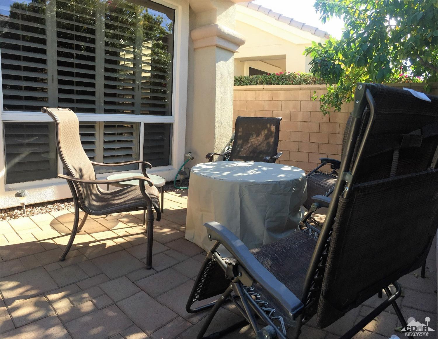 37235 Skycrest Road Palm Desert, CA 92211 - Photo 32 of 34 a view of balcony with wooden floor outdoor seating and yard