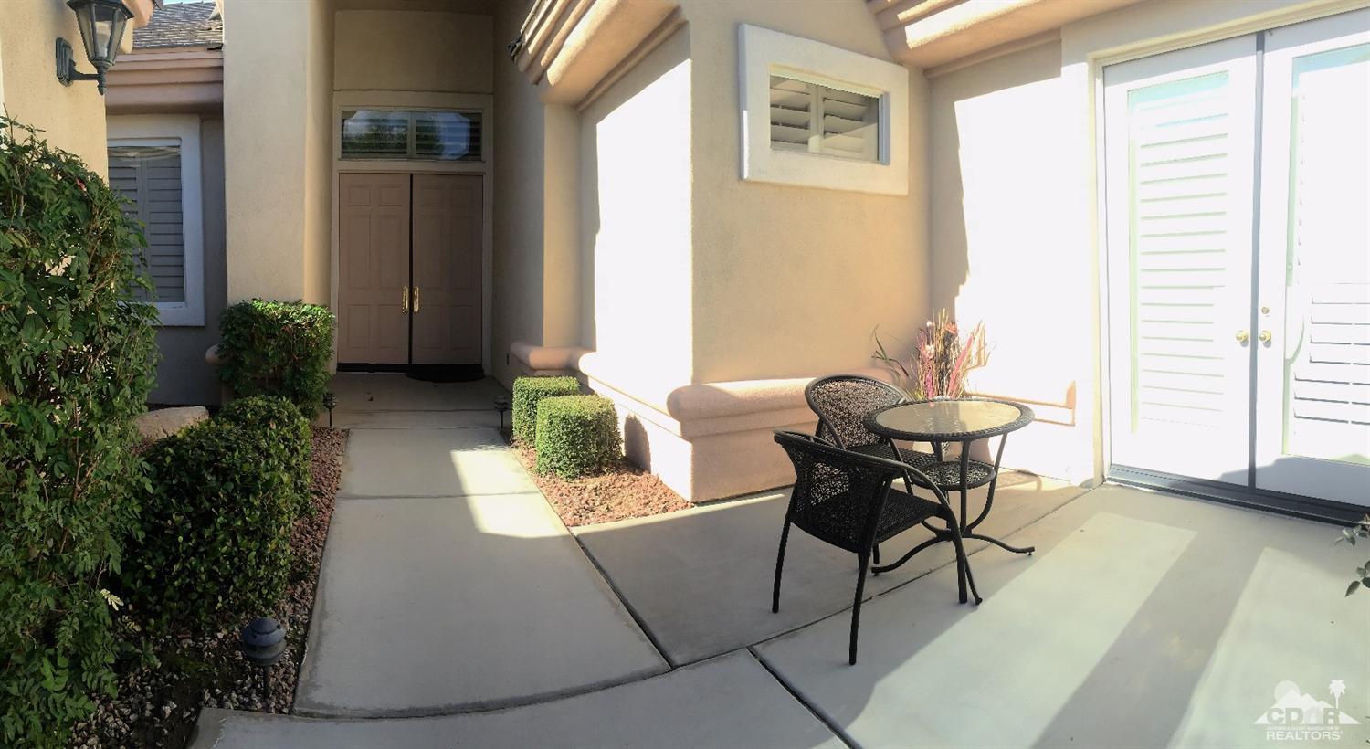 37235 Skycrest Road Palm Desert, CA 92211 - Photo 6 of 34 a view of a tables and chairs in back yard of the house