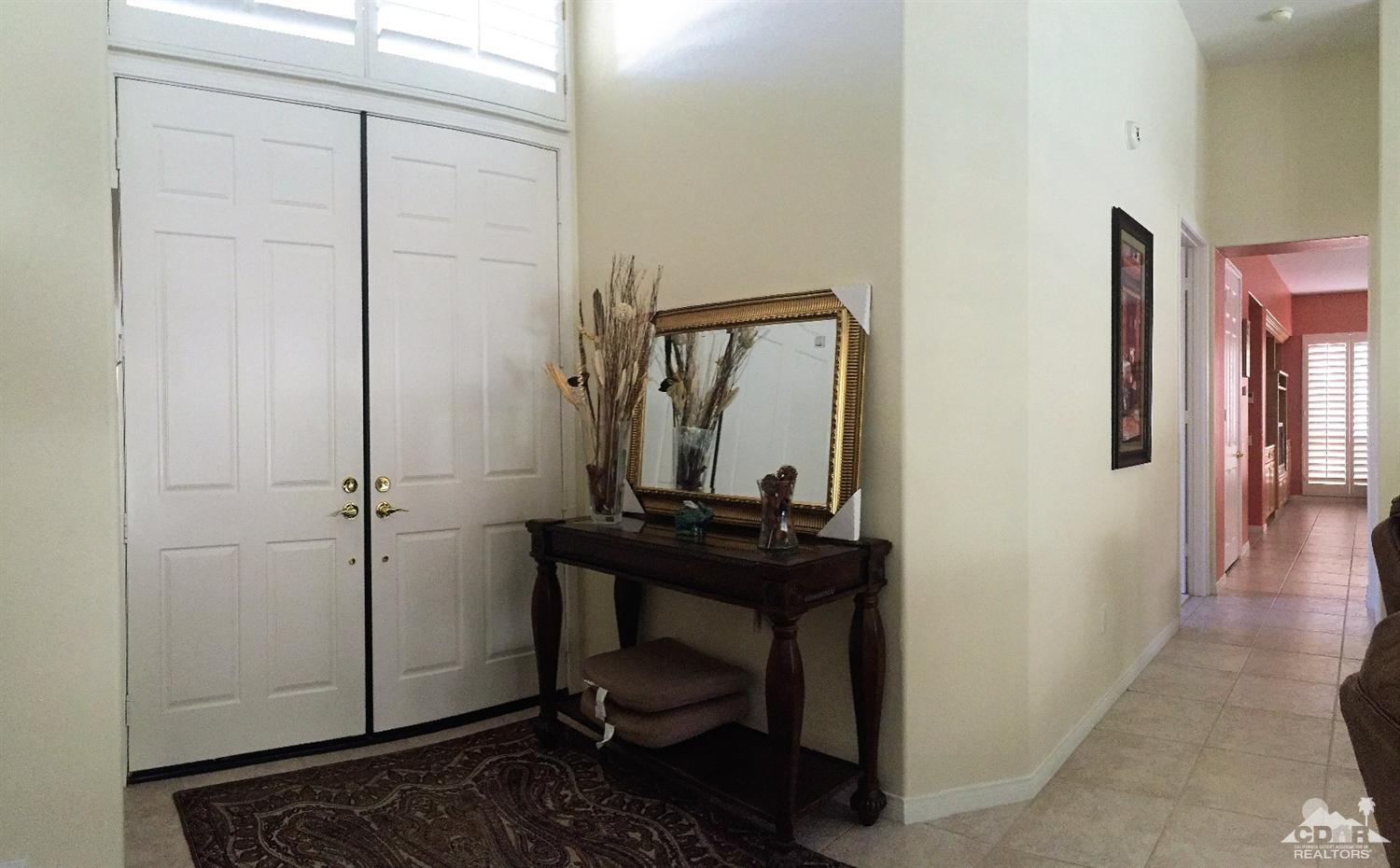37235 Skycrest Road Palm Desert, CA 92211 - Photo 7 of 34 a view of a bedroom from a hallway
