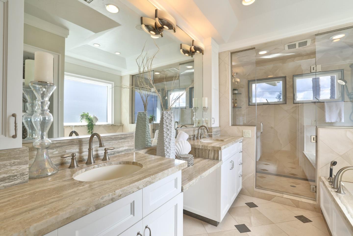 1870 Patio Drive San Jose, CA 95125 - Photo 19 of 47 a bathroom with double vanity sinks a mirror and a shower