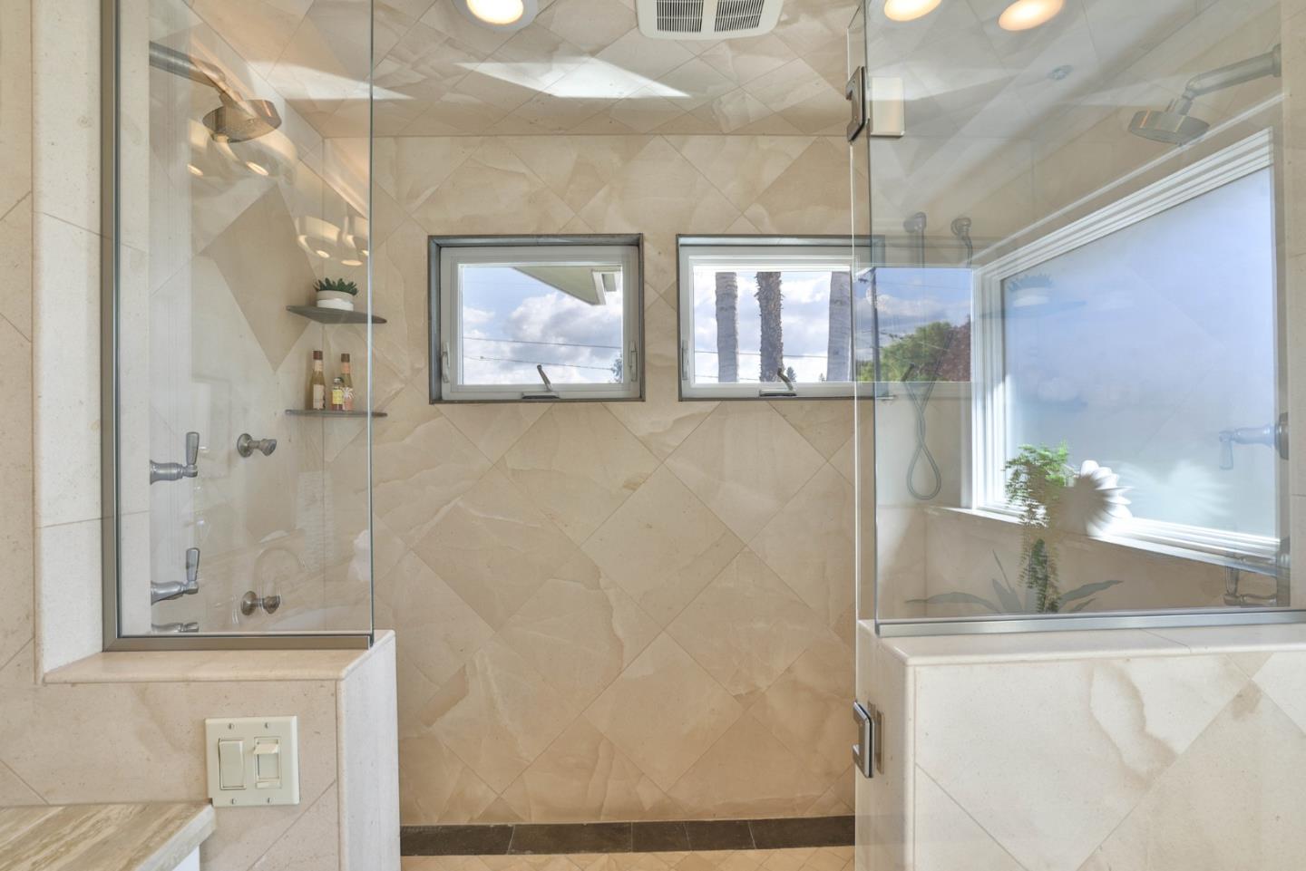 1870 Patio Drive San Jose, CA 95125 - Photo 20 of 47 a bathroom with a granite countertop sink a mirror and a shower