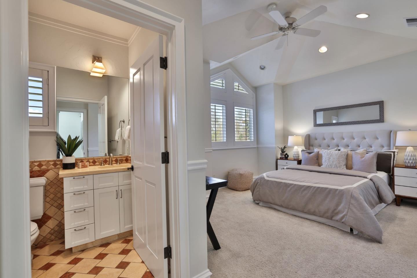 1870 Patio Drive San Jose, CA 95125 - Photo 25 of 47 a spacious bedroom with a bed and a chandelier