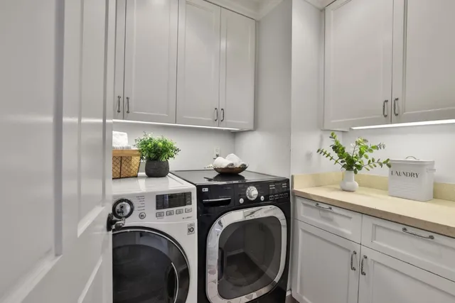a view of a balcony with a floor to ceiling window next to a yard