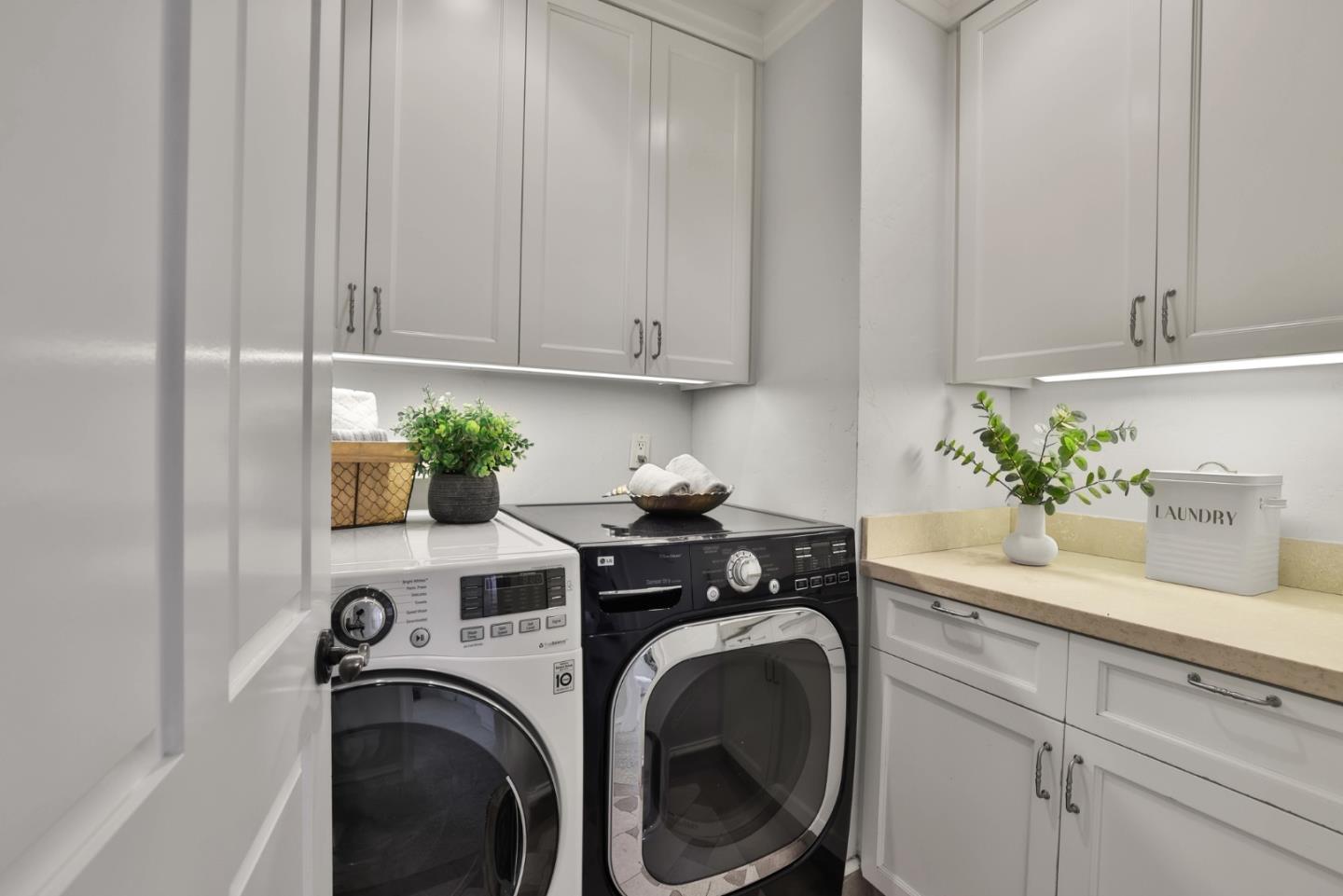 1870 Patio Drive San Jose, CA 95125 - Photo 30 of 47 a view of washer and dryer with kitchen countertops