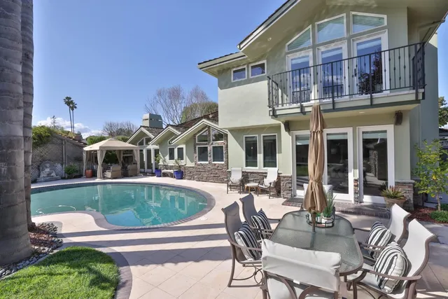 a view of outdoor space and swimming pool