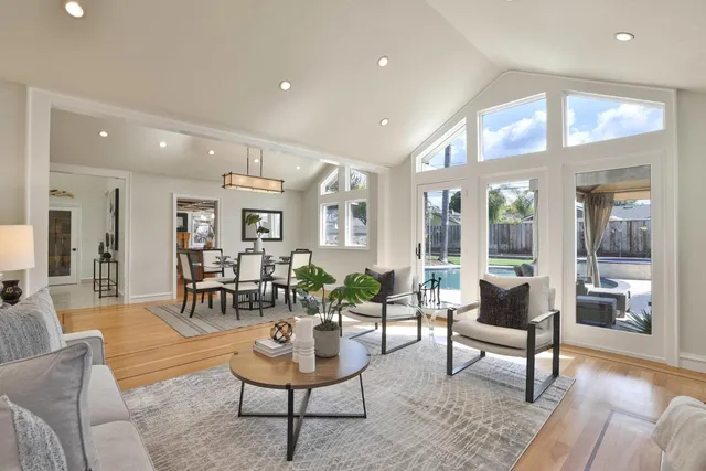 a living room with furniture and a table