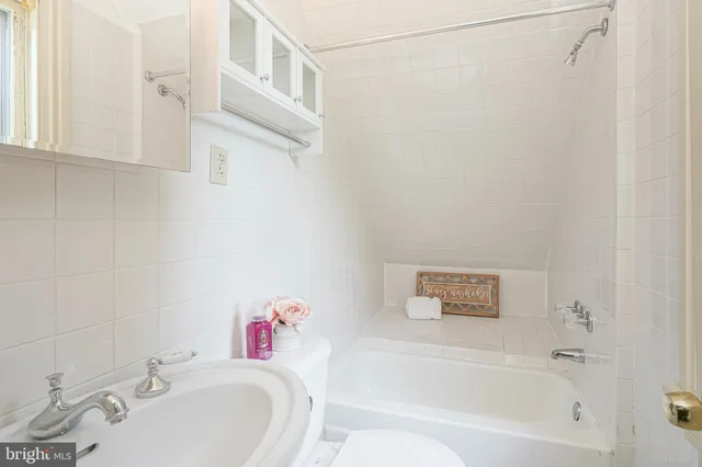 a bathroom with a sink and a bathtub