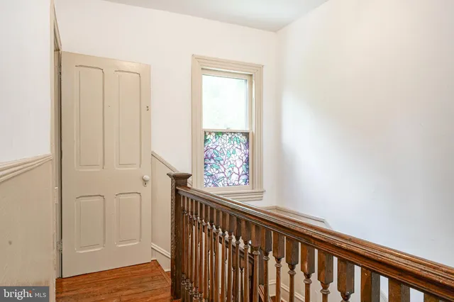 a view of entryway with wooden floor