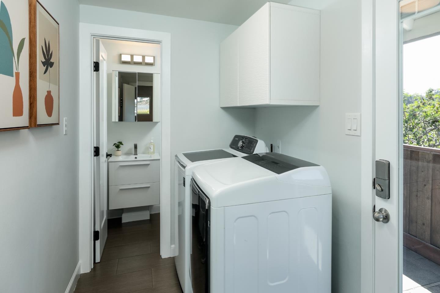 147 Lakeshore Drive San Mateo, CA 94402 - Photo 22 of 36 a utility room with dryer and washer