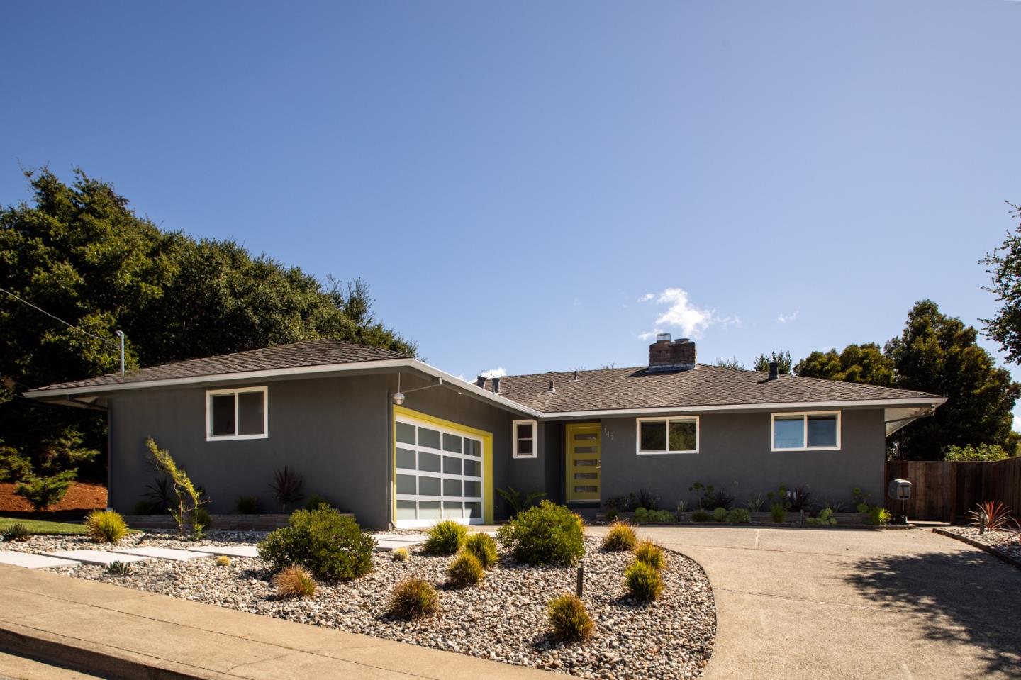147 Lakeshore Drive San Mateo, CA 94402 - Photo 35 of 36 a front view of a house with a yard
