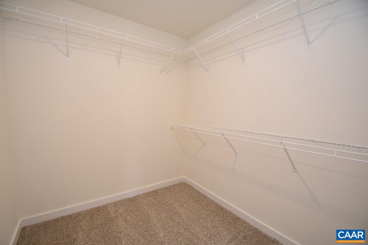 5 Bacon Bit Lane Louisa, VA 23093 - Photo 16 of 27 a view of a room with racks on the wall