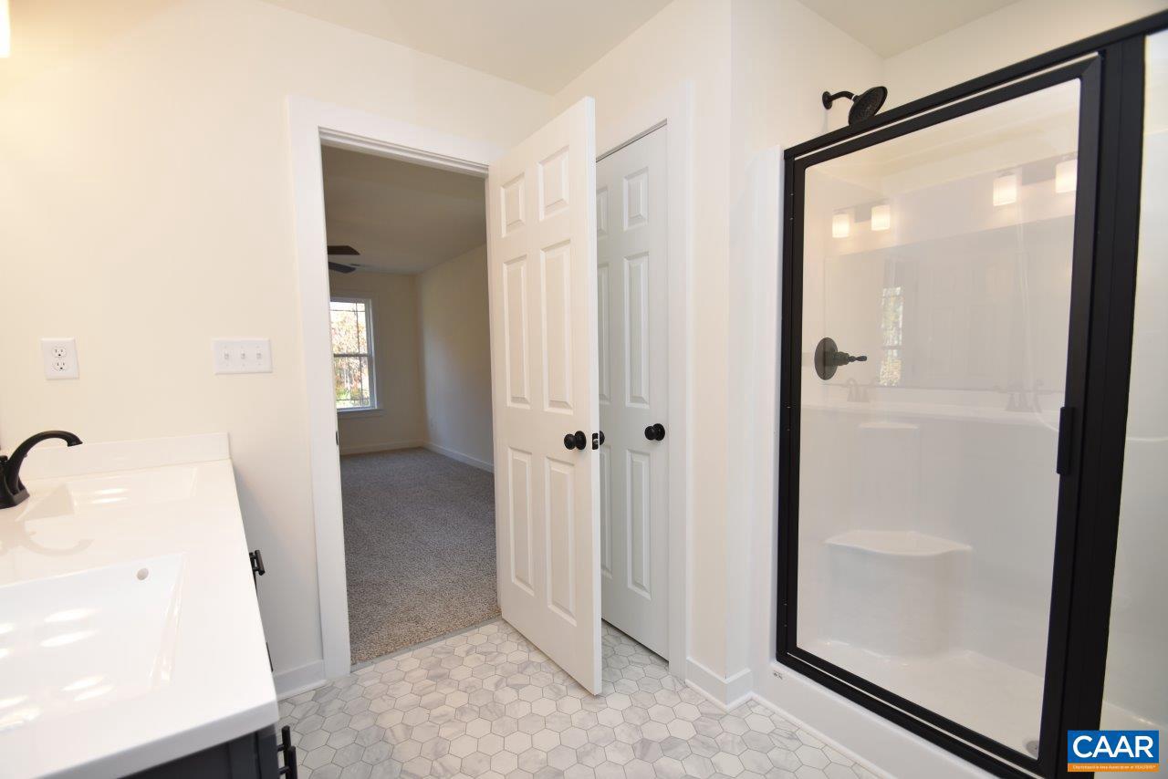 5 Bacon Bit Lane Louisa, VA 23093 - Photo 20 of 27 a view of a bathroom with a glass door shower